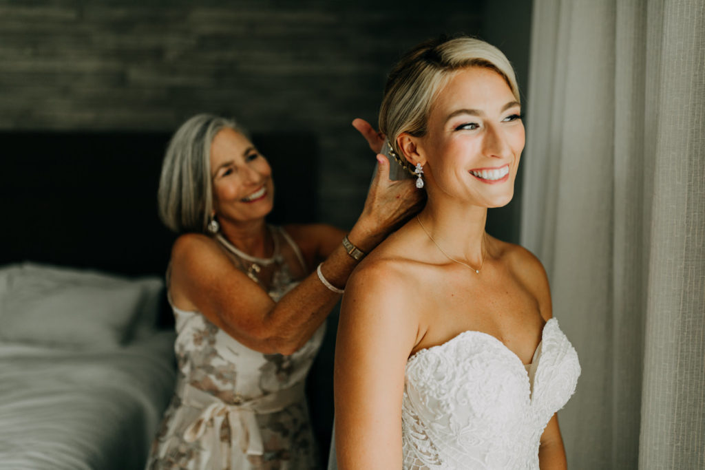 Florida Bride Getting Wedding Ready in Lace and Illusion Sweetheart Strapless Wedding Dress with Mom | Tampa Bay Wedding Photographer Amber McWhorter Photography