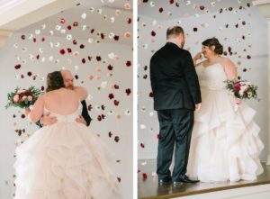 Tampa Bride in Ruffle Tulle Skirt Blush Lining Ballgown Wedding Dress First Look with Groom and Hanging Flowers Backdrop | Wedding Florist Brides N' Blooms Wholesale Designs