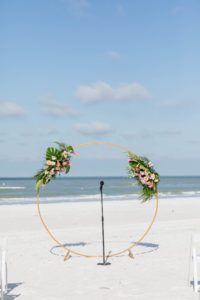 Beach Wedding Round Arch Beach Wedding Round Arch Floral Arrangement Spray | Tropical Wedding Flowers with Monstera Leaf Greenery, Peach Roses, White Anthurium, and Pink ProteaArrangement Spray | Tropical Wedding Bride and Bridesmaid Bouquets with Monstera Leaf Greenery, Peach Roses, White Anthurium, and Pink Protea