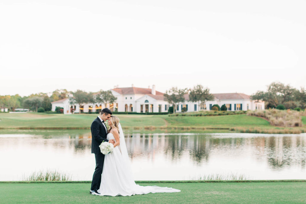 Classic Bride and Groom by Lake at Bradenton Classic Wedding Venue Concession Golf Club