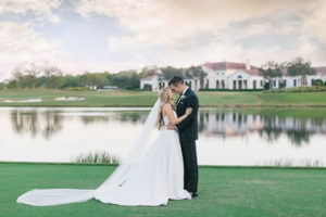 Classic Bride and Groom by Lake at Bradenton Classic Wedding Venue Concession Golf Club