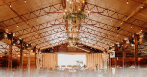 Romantic Barn Wedding Reception Decor, Hanging String Lights | Plant City Wedding Venue Florida Rustic Barn Weddings