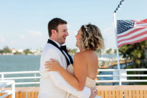 Florida Bride and Groom in White Tuxedo First Look Portrait | Waterfront Wedding Venue Yacht StarShip | Tampa Bay Wedding Photographer Limelight Photography