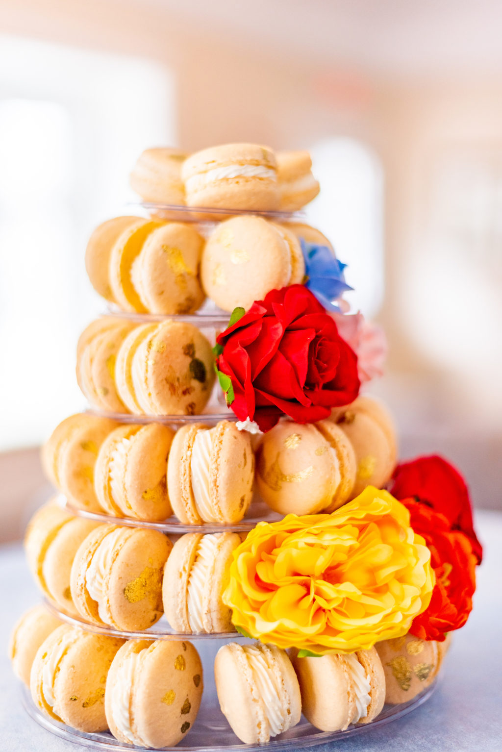 Wedding Macaron Tower Dessert Display with Colorful Flowers