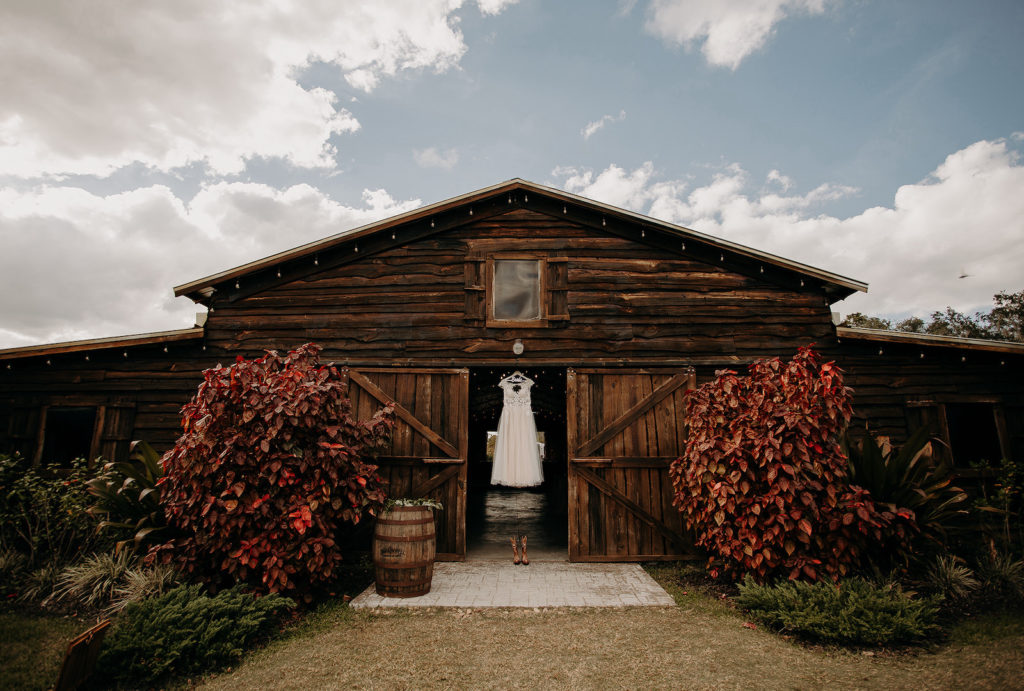 Rustic Barn with Wedding Dress Hanging | Wedding Venue Florida Rustic Barn Weddings