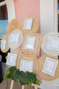 Tropical Boho Beach Wedding Seating Chart with Woven Rattan Placemats and Framed Table Card Seating Assignment