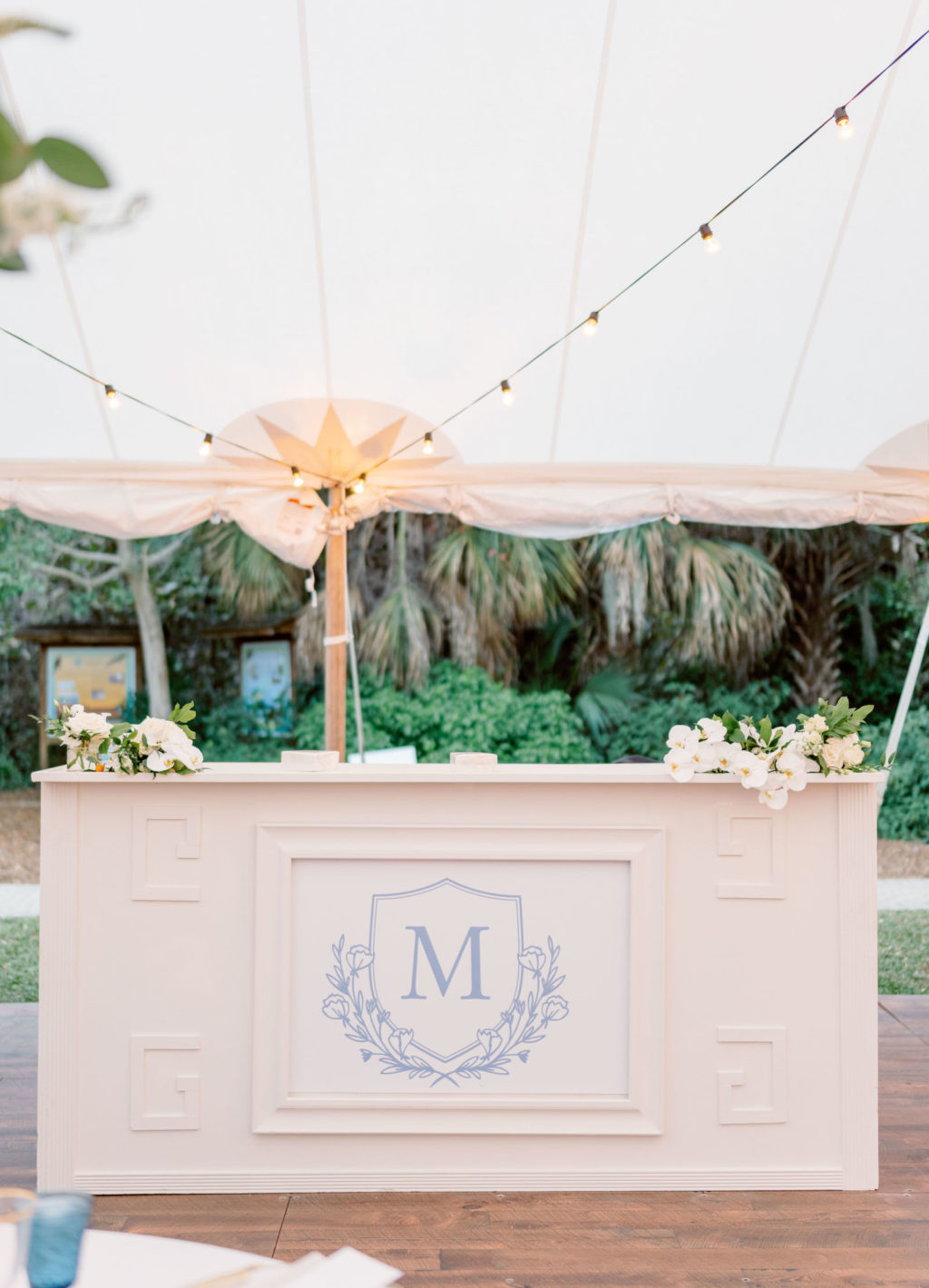 Elegant Luxurious Wedding Reception Decor, White Bar with Dusty Blue Personalized Monogram, Tent Wedding with String Lights | Tampa Bay NK Productions Wedding Planning