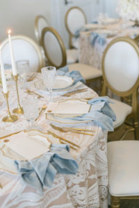 Classic Modern Wedding Reception Decor, Table with Floral Lace Table Linen with Blush Pink Underlay, French Country White and Wooden Dining Chair, Gold Candlesticks and Flatware, White and Gold China | Tampa Bay Wedding Planner Parties A'la Carte | Wedding Rentals Kate Ryan Event Rentals | Bradenton Wedding Venue Concession Golf Club