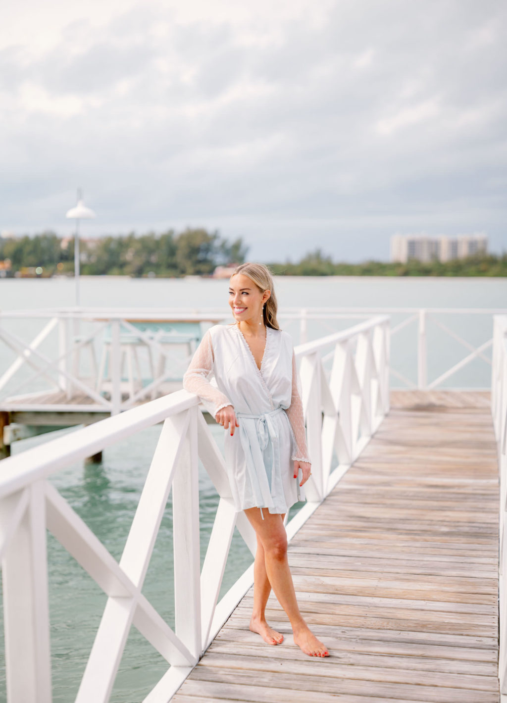 Florida Bride in Light Blue Robe on Waterfront Tampa Boat Pier