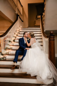 Classic Bride and Groom on Stairs of Wedding Venue The Orlo House with Floating Candles | Tampa Bay Wedding Photographer Lifelong Photography Studio