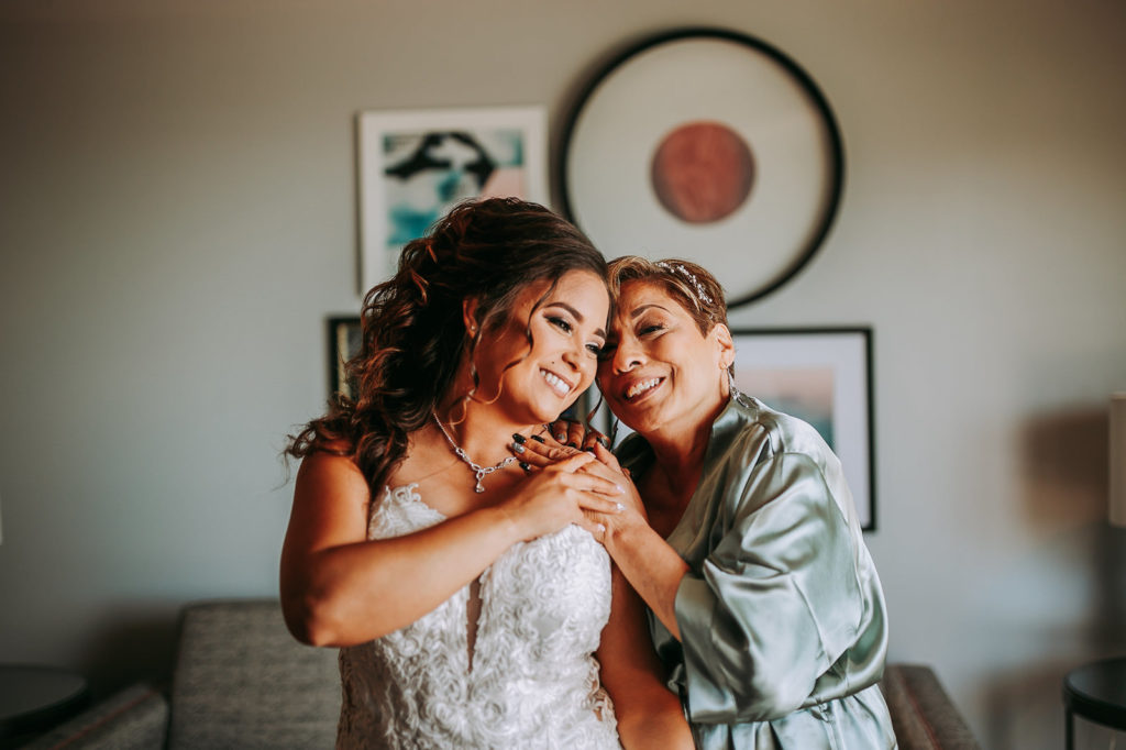 Bride and Mother of the Bride Getting Ready in Hotel Room | Mother of the Bride Helping Bride Get Dressed and Ready