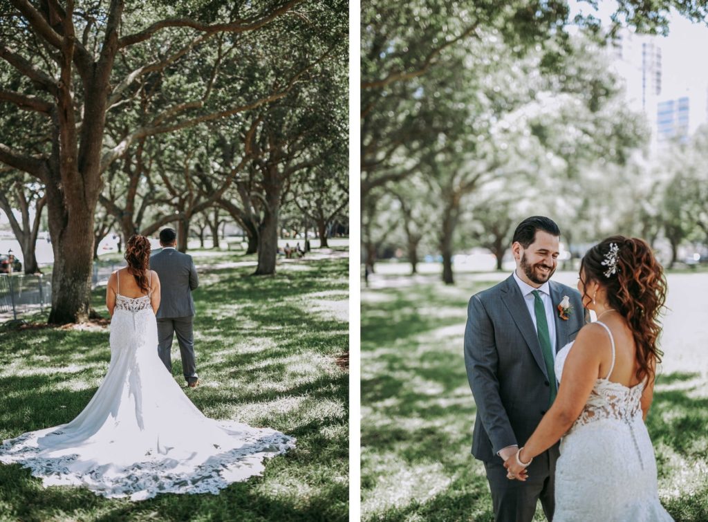 Outdoor Bride and Groom First Look Portrait | Groom Wearing Classic Charcoal Grey Suit with Green Tie | Lace Fit and Flare Mermaid Spaghetti Strap Wedding Dress Bridal Gown with Scallop Edge Lace Train Hem