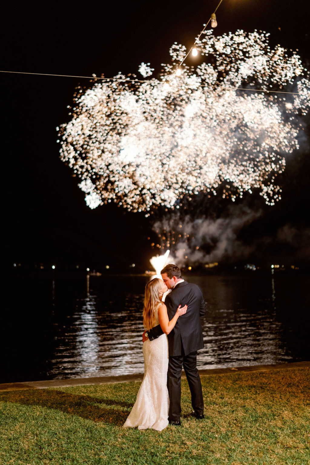 Elegant Luxurious Bride and Groom Waterfront Fireworks Photo | Tampa Bay Nk Productions Wedding Planning