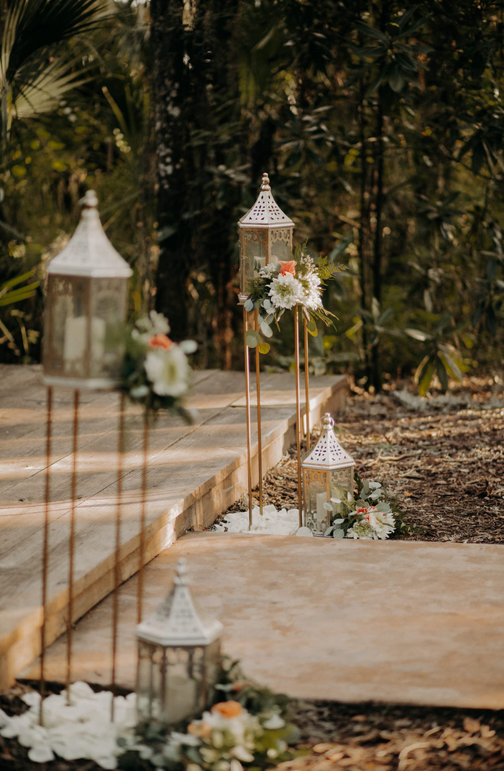 Tampa Rustic Wedding Ceremony Decor, Tall Candle Lanterns with Floral Arrangements | Plant City Wedding Venue Florida Rustic Barn Weddings