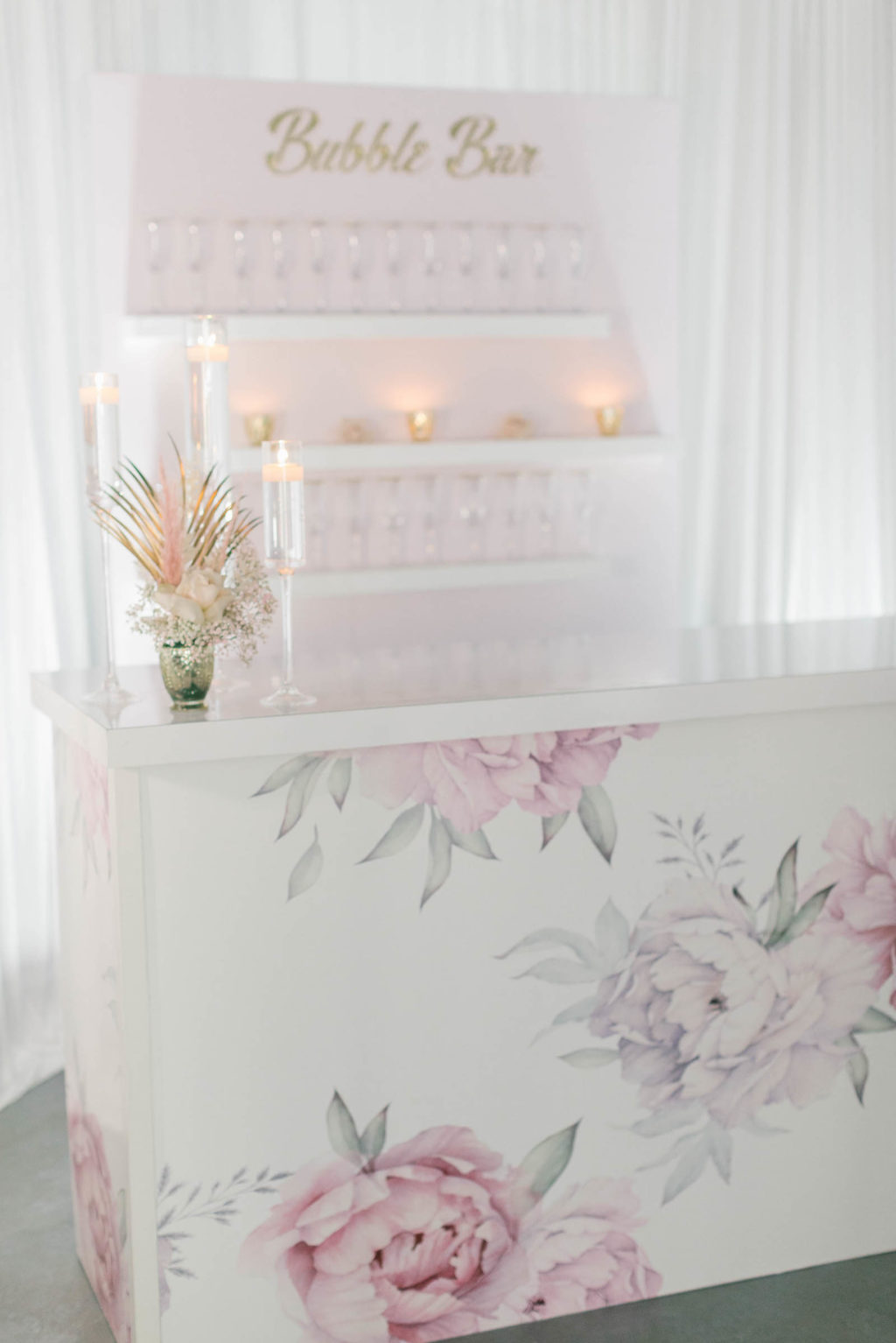 Clearwater Beach Wedding Venue Bellwether Beach Resort Styled With Love Something Bleu by McKenna Bleu | Instagram Wedding Designer Inspiration | Floral Wrapped Custom Bar with Bubble Bar Champagne Wall Shelf Display