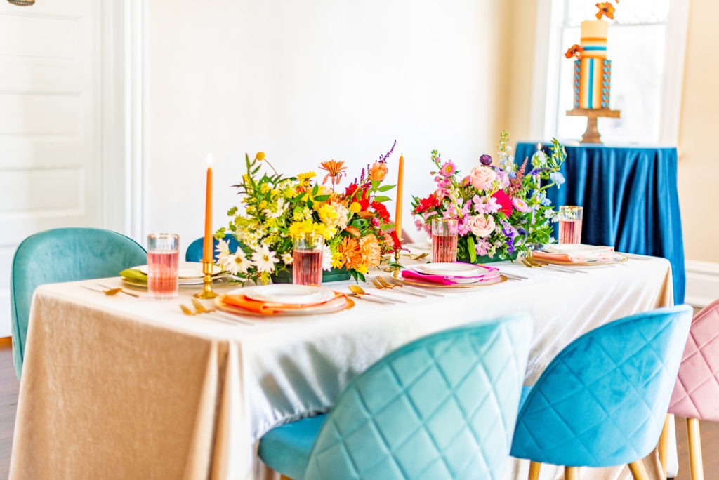 Tampa Wedding Styled Shoot 70's Retro Vintage | Velvet Chairs and Velvet Table Linen by Kate Ryan Event Rentals | Colorful Vibrant Wedding Centerpiece and Napkins