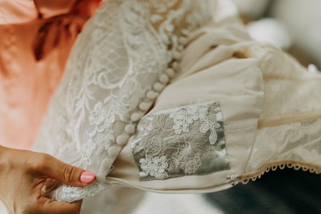 Personal Lace Patch Something Old Stitched Into Bride Wedding Dress | Tampa Bay Wedding Photographer Amber McWhorter Photography