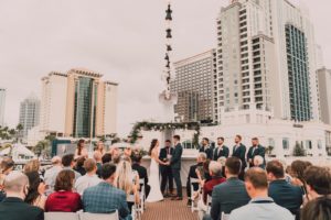 Florida Minimalistic Bride and Groom Exchanging Wedding Vows on Tampa Bay Waterfront Wedding Venue Yacht StarShip | Wedding Photographer and Videographer Bonnie Newman Creative