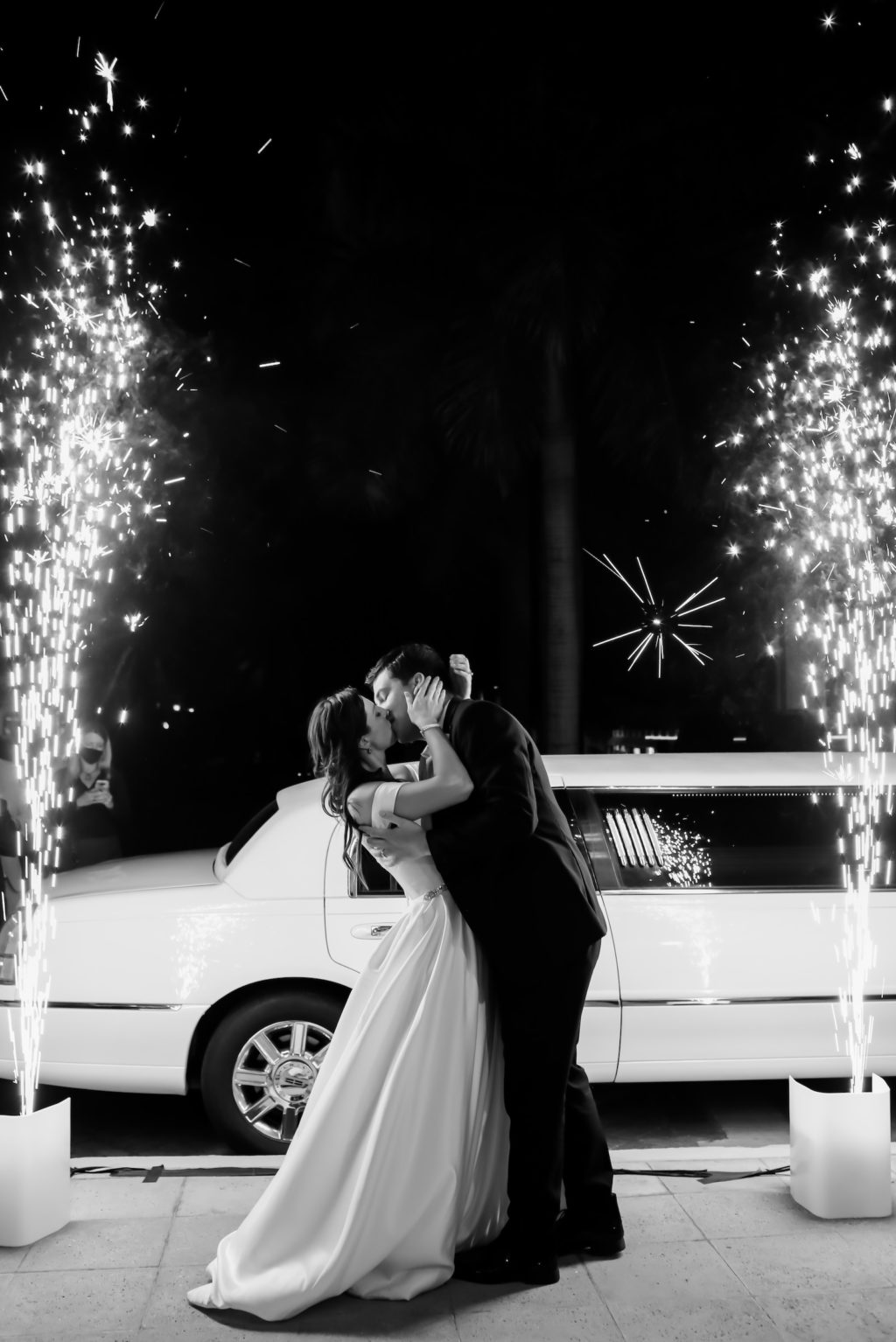 Elegant Classic Bride and Groom Kissing Sparkler Wedding Exit Black and White Photo | Tampa Bay Wedding Photographer Lifelong Photography Studio