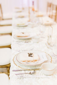 Elegant Garden Wedding Reception Decor, Long Feasting Table with White Floral Table Linen, Scalloped Gold and Clear Charger | Tampa Bay Wedding Rentals Kate Ryan Event Rentals