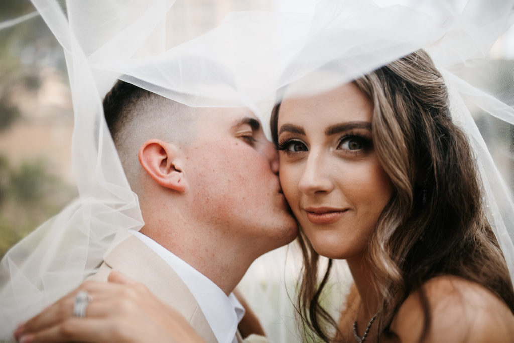 Tampa Bride and Groom Wedding Portrait Under Veil