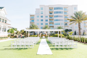 Elegant Outdoor Clearwater Lawn Wedding Ceremony and Decor at Belleview Inn, Large Floral Circle Arch with Blush Pink Cherry Blossoms, White Aisle Runner | Florida Luxury Wedding Planner Parties A'La Carte