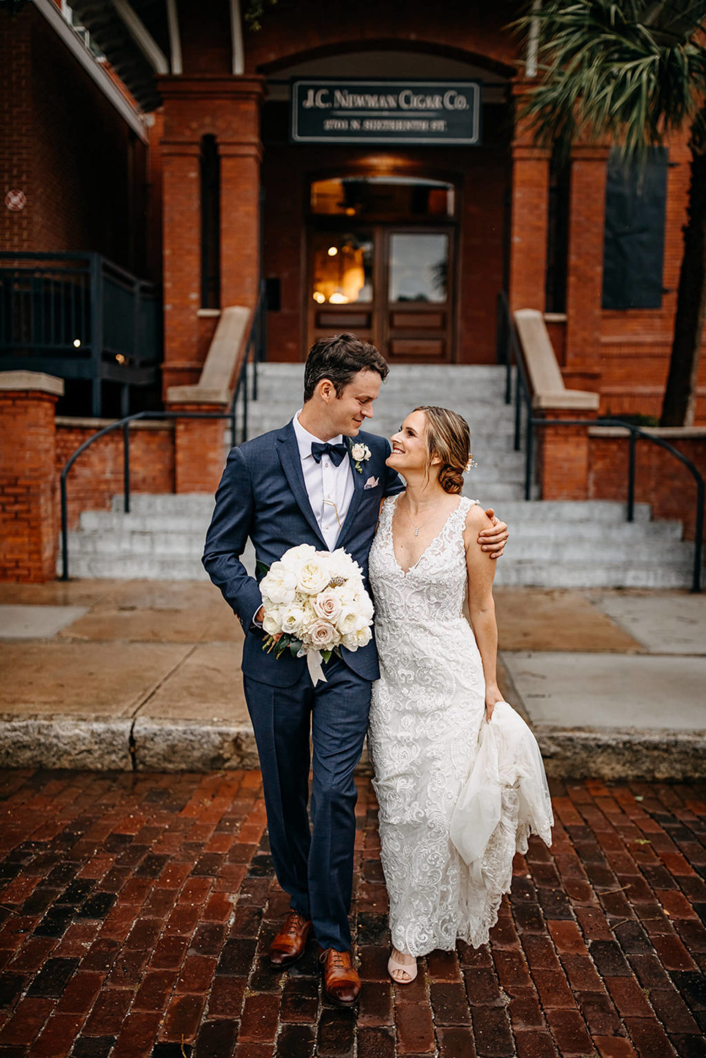 Tampa Bay Bride and Groom in front of Wedding Venue J.C. Newman Cigar Co. in Ybor City, Tampa