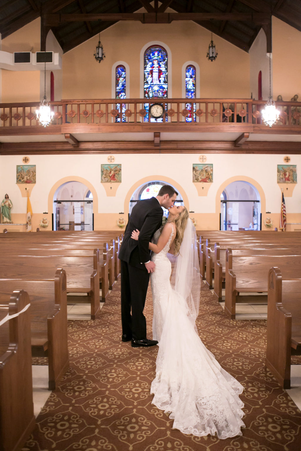 Bride and Groom Ceremony Kiss | Florida Wedding | Our Lady of Perpetual Help