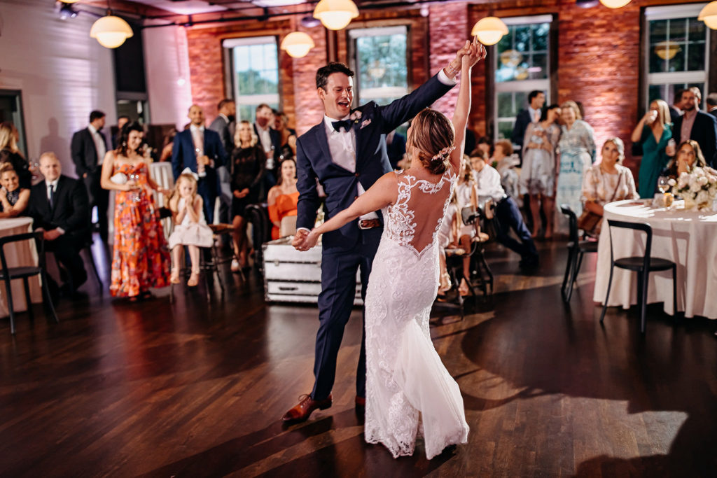 Ybor Bride and Groom First Dance at Industrial Inspired Wedding Reception | Historic Florida Wedding Venue J.C. Newman Cigar Co.