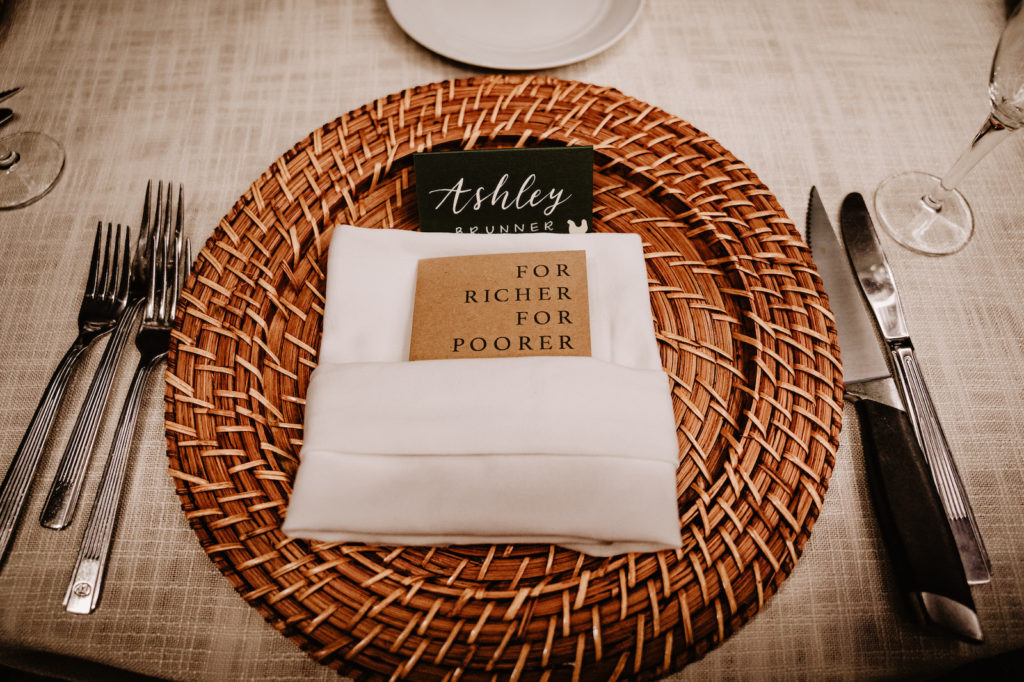 Tropical Elegant Wedding Reception Decor, Brown Woven Charger, White Linen Napkin, Kraft Paper Signage "For Richer For Poorer"
