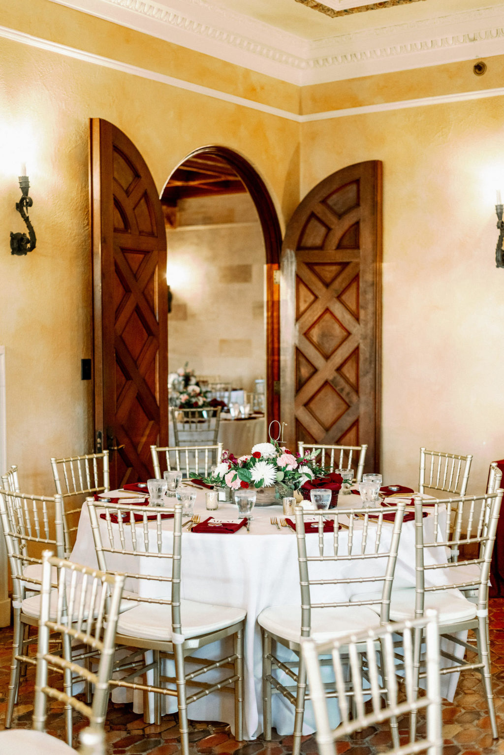 Timeless Romantic Wedding Reception Decor, Round Tables with White Linens, Gold Chiavari Chairs, Floral Burgundy Red, Pink and White Floral Centerpieces | Tampa Bay Wedding Photographer Dewitt for Love Photography | Sarasota Wedding Venue Powel Crosley Estate