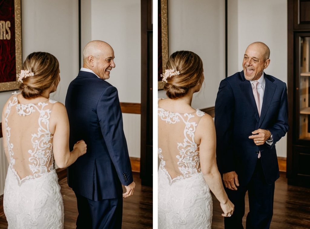 Tampa Bay Bride and Father First Look, Father of the Bride wearing Navy Blue Suit and Blush Pink Tie, Bride wearing Lace Open Back Wedding Dress with Low Chignon Bun with Floral Hair Accessories | Florida Unique Wedding Venue J.C. Newman Cigar Co.