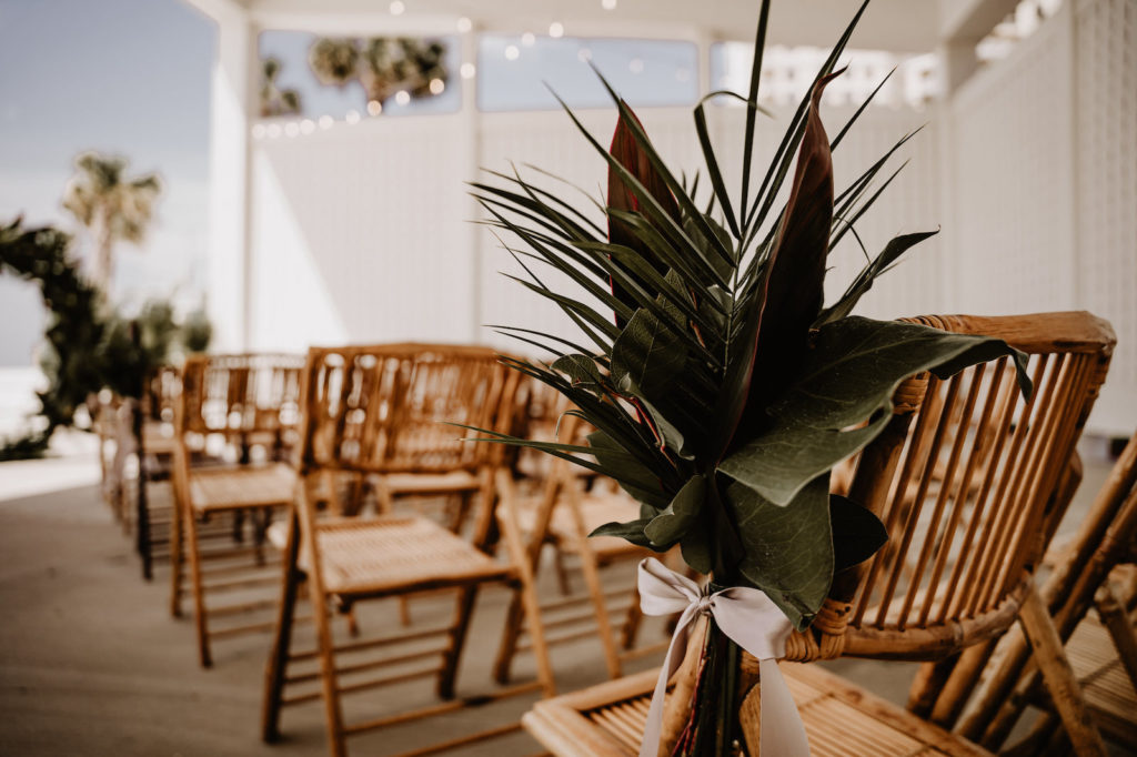 Tropical Elegant Wedding Ceremony Decor, Bamboo Chairs with Palm Fronds and Leaves Arrangement | Tampa Bay Wedding Florist Iza's Flowers