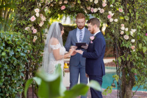 Small Intimate South Tampa Backyard Wedding Ceremony Vox Exchange with Greenery Ceremony Arch