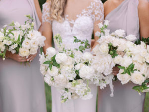 Classic Florida Bride and Bridesmaids Holding Lush White Roses Floral Bouquet