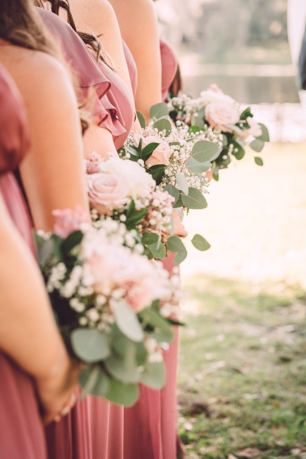 Romantic Shabby Chic Bridesmaids in Mauve/Dusty Rose Dresses Holding Eucalyptus, Baby's Breathe and Blush Pink Roses Floral Bouquets | Tampa Bay Wedding Photographer Bonnie Newman Creative