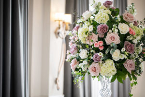 Tampa Bay Wedding Reception Decor, Sprawling Floral Arrangement with Blush Pink Roses, Purple Carnations, Ivory Stems and White Hydrangeas with Greenery | Tampa Bay Wedding Florist Iza's Flowers | St. Petersburg Wedding Planner Blue Skies Weddings and Events | Florida Wedding Photographer Limelight Photography