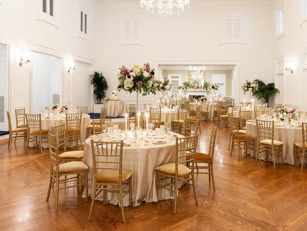 Classic Wedding Reception Ballroom Decor, Gold Chiavari Chairs with Velvet Cushions, Tall and Short Floral Centerpieces | Tampa Bay Wedding Rentals Kate Ryan Event Rentals | Wedding Venue Tampa Yacht and Country Club