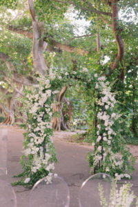 Luxurious and Elegant Wedding Ceremony Decor, Semi Circle Arch with Lush White Flowers and Greenery Leaves