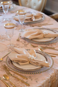 Romantic Intimate Wedding Reception Tablescape with Textured Linens, Gold Flatware, Glass Beaded Chargers, Gold Rimmed Glasses, Blush Pink Napkins with Pearl Napoke Holder | Tampa Bay Rental Company Outside the Box Event Rentals