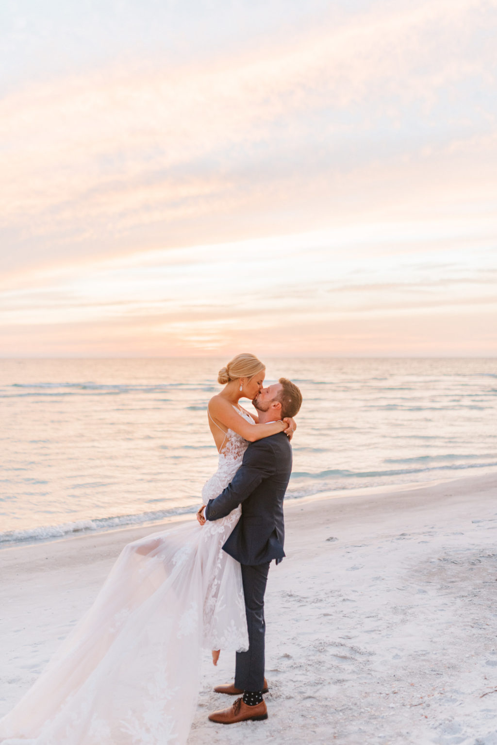 Romantic Florida Bride and Groom Kissing on Beach During Sunset | Sarasota Wedding Venue The Resort at Longboat Key Club