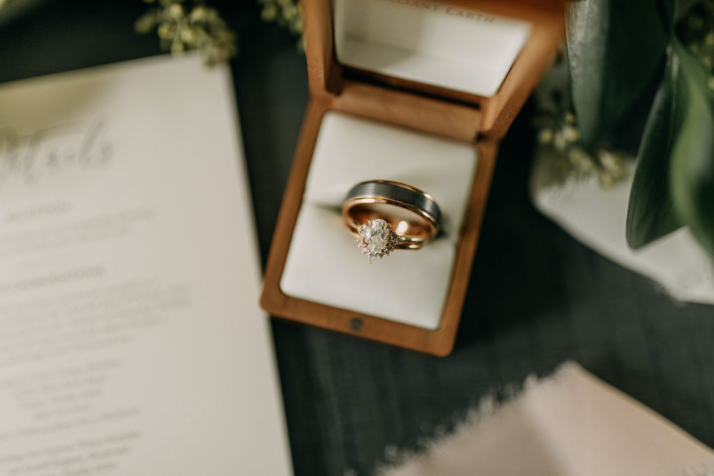 Unique Oval Diamond Engagement Ring with Starburst Halo Yellow Gold Ring, Groom Wedding Band in Wooden Ring Box | Tampa Bay Wedding Photographer Amber McWhorter Photography