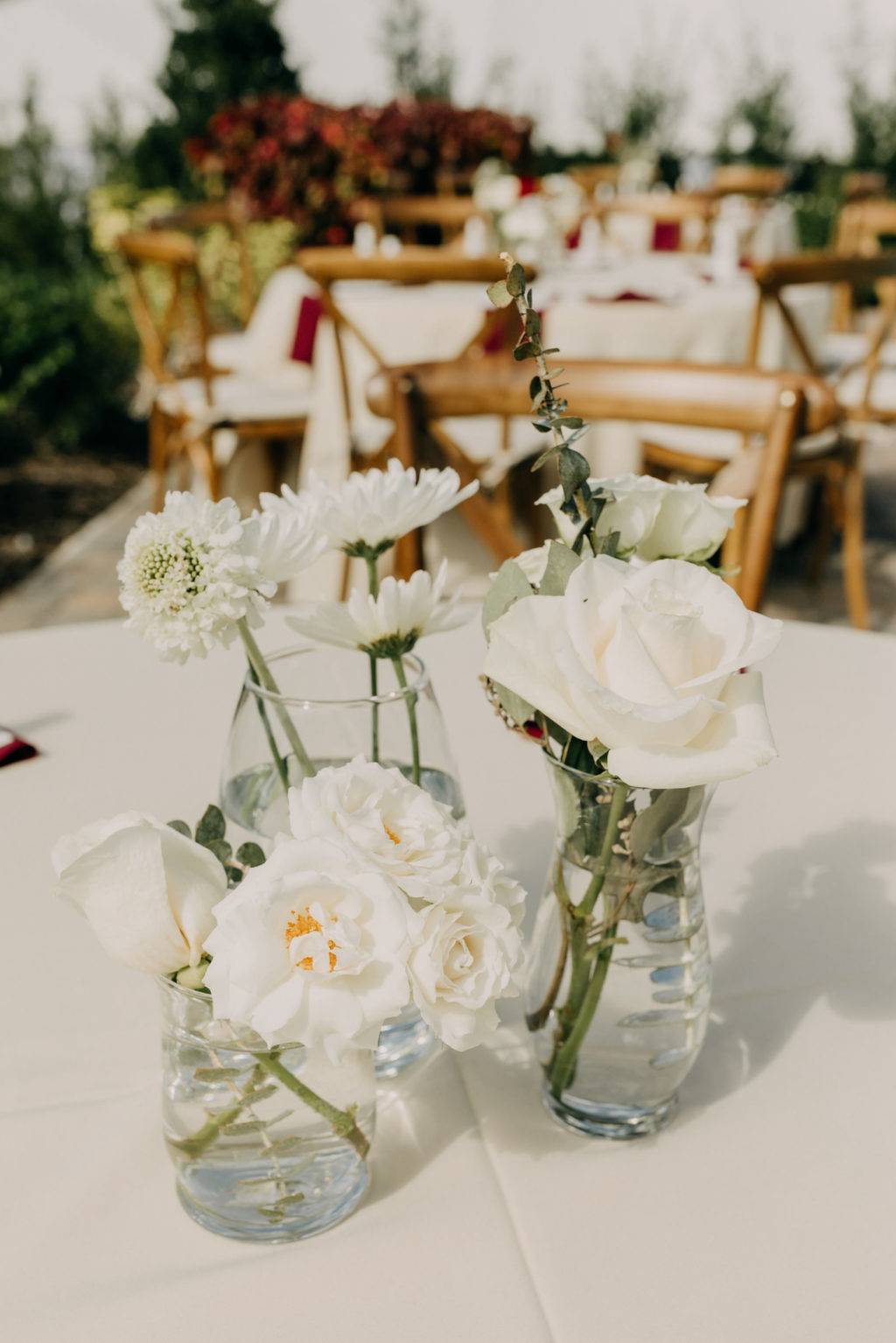 Garden Inspired Wedding Reception Decor, Low Simple White Roses and Single Stem Flowers in Mason Jars Centerpiece | Tampa Bay Wedding Photographer Amber McWhorter Photography | Wedding Florist Brides & Blooms