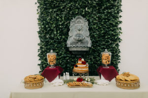 Garden Inspired Wedding Reception Decor, Greenery Leaves Backdrop with Water Fountain on Wall, Dessert Table, Three Tier Naked Wedding Cake, Cookies Display | Tampa Bay Wedding Photographer Amber McWhorter Photography