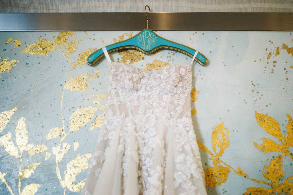 Wedding Dress Hanger Shot | Ghalia Lahav Designer Strapless Wedding Dress with Embroidered Floral Lace | Luxury Wedding Gowns