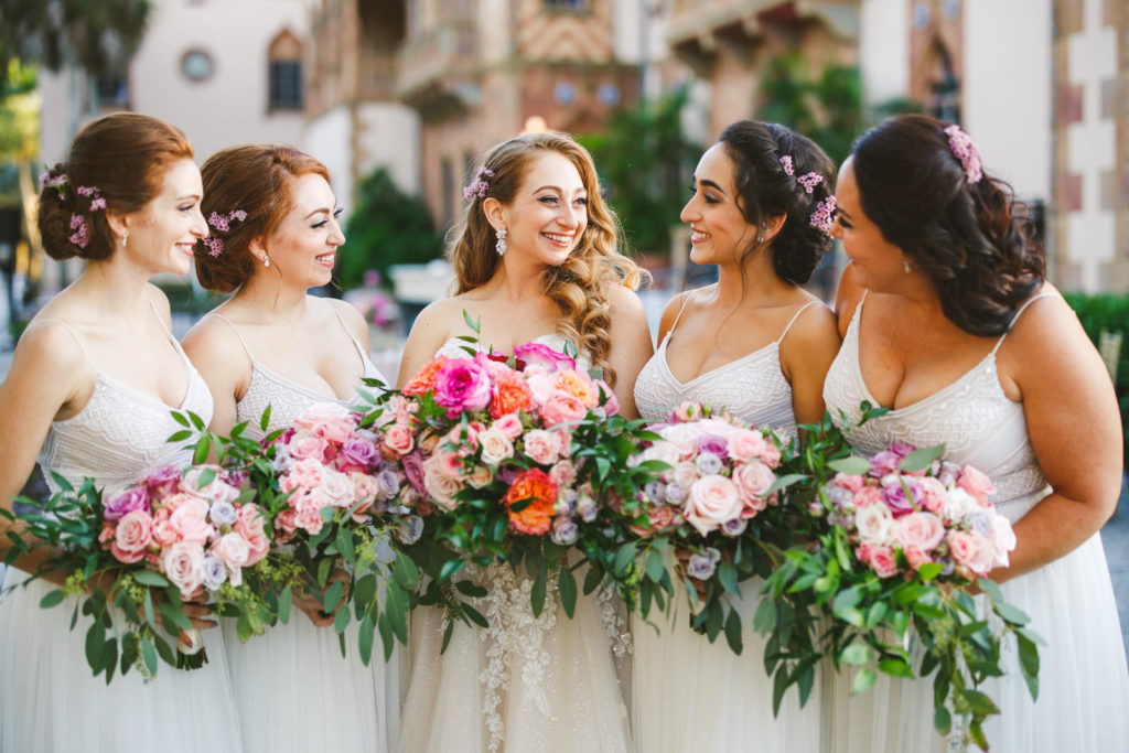 Bride and Bridesmaids Portrait Shot | Colorful Wedding Bouquets with Orange and Pink Garden Roses, Blush Peach and Purple Spray Roses and Eucalyptus Greenery | Silver Taupe Light Grey Long Chiffon Bridesmaid Dresses by Adrianna Papell