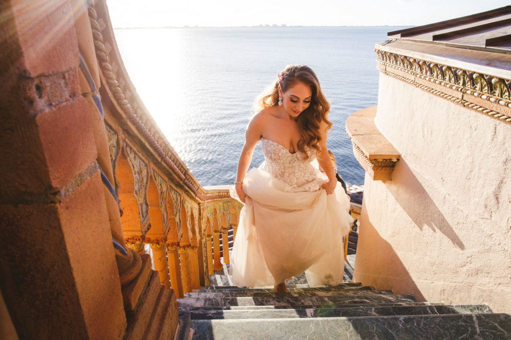 Outdoor Staircase Bridal Portrait | Ghalia Lahav Designer Strapless Wedding Dress with Embroidered Floral Lace and Tulle Skirt | Sarasota Luxury Wedding