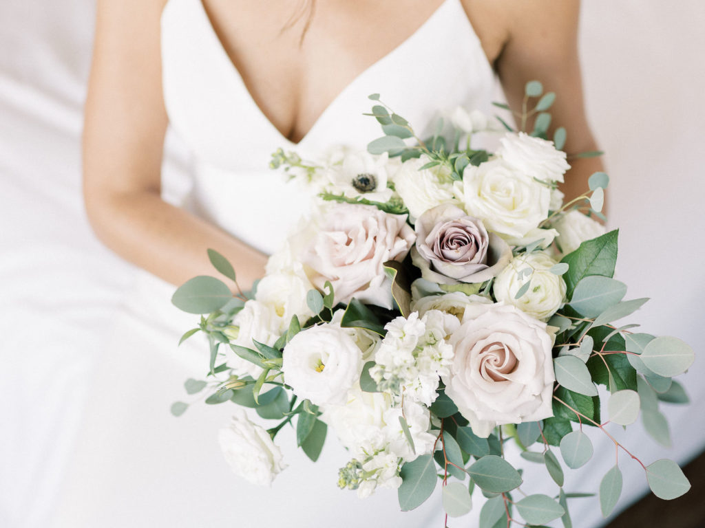 Florida Bride Holding Mauve and White Roses, Anemone and Eucalyptus Floral Bouquet