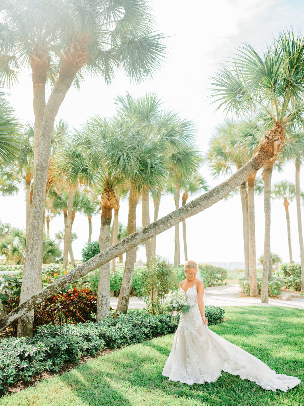Romantic Bride Wearing Spaghetti Strap Lace Wedding Dress Outdoor Under Palm Trees