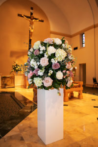 Tampa Bay Traditional Church Wedding Ceremony Decor, Sprawling Alter Floral Arrangement with Blush Pink Roses, Purple Carnations, Ivory Stems and White Hydrangeas with Greenery | Tampa Bay Wedding Florist Iza's Flowers | St. Petersburg Wedding Planner Blue Skies Weddings and Events | Florida Wedding Photographer Limelight Photography Studios | St. Paul Catholic Church in St. Pete